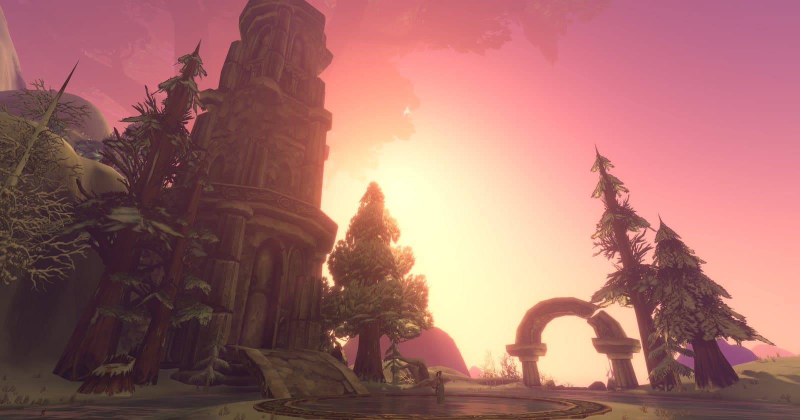 A tall ruined stone tower and a broken arch among pines at sunset in Hyjal, from Blizzard's WoW Forever raid screenshots